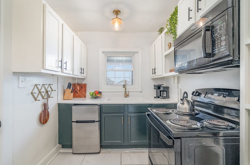 Well appointed kitchenette with all the essentials for cooking your favorite meals and both drip and Keurig coffee makers.