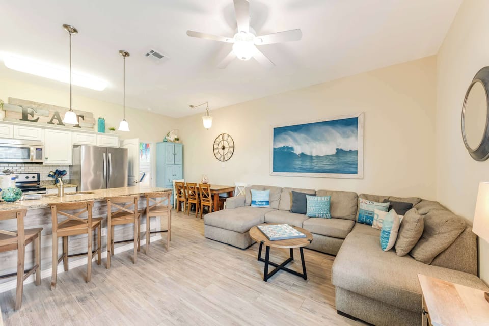 Coffee in the morning, cocktails in the evening, and a whole lot of cozy in between. This living room is ready for all your vacation moods.