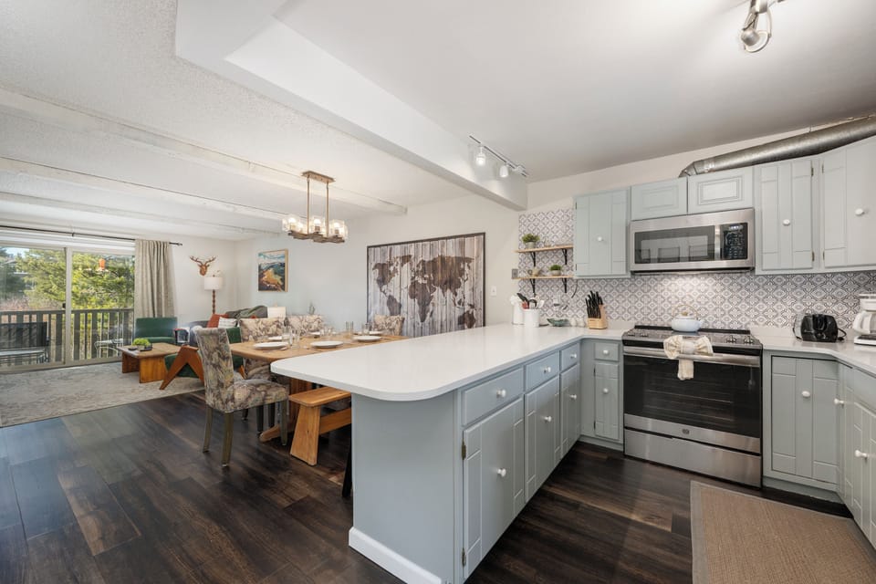 Your spacious kitchen island becomes the heart of your vacation home, perfect for preparing meals and gathering with loved ones.