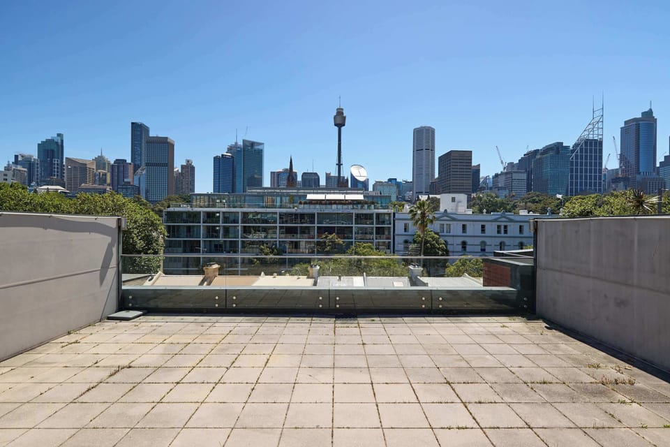 Rooftop Terrace Panorama:
Spectacular private rooftop terrace with unobstructed panoramic Sydney skyline views. Spacious entertaining space perfect for morning yoga, sunset drinks, or simply soaking in the iconic city vistas.