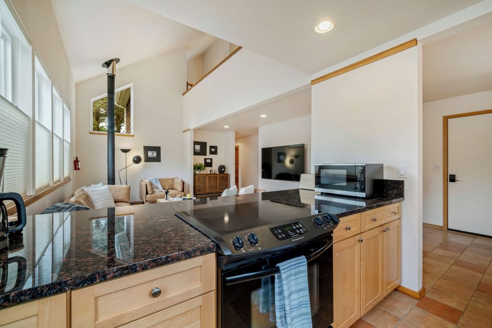 Kitchen open to the living area.