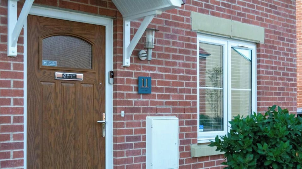 Main entrance door and outdoor meter box