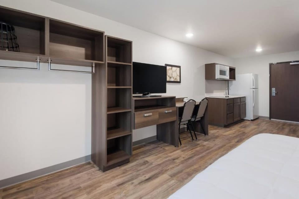 Organize with open shelving, then relax in an easy studio layout.
