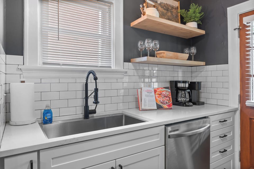 Kitchen with SS appliances, large sink, Keurig and traditional coffee maker.