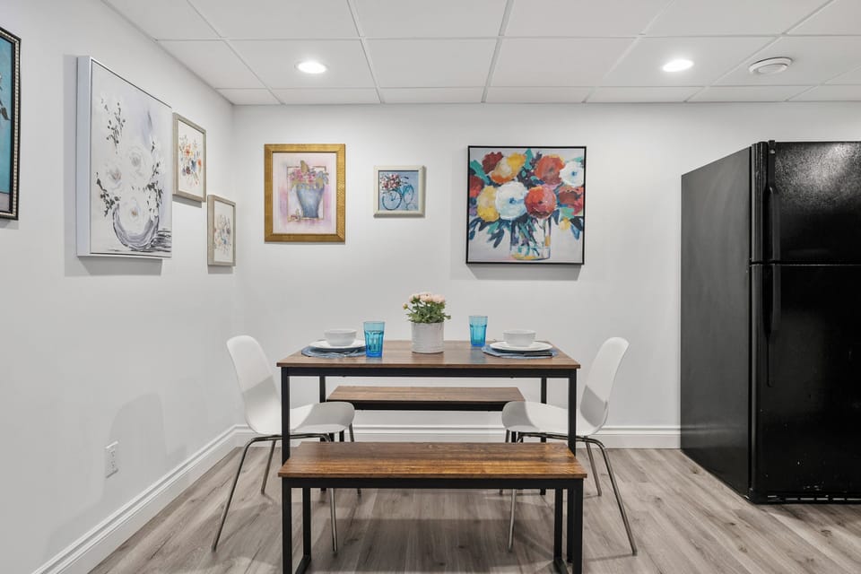 Bench seating + colorful art perfect for family dinners.