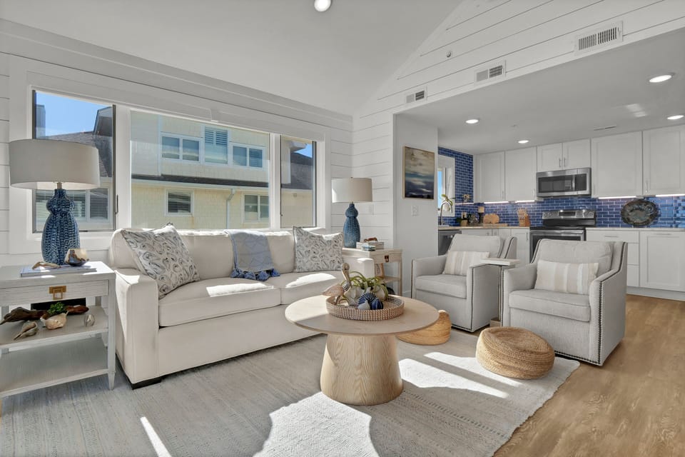 Sun-filled lounge space with coastal décor
