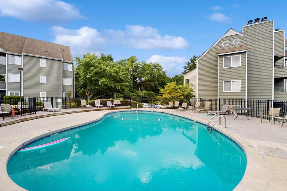 Resort pool oasis awaits. And, dive into relaxation at our sun-kissed pool surrounded by lush greenery!