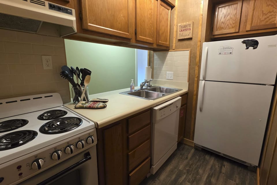Cook up a storm in this well-equipped space with rustic charm and modern amenities!