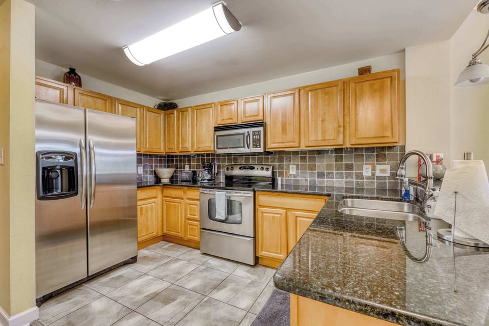 Kitchen, enjoy modern appliances and ample counter space for culinary adventures!