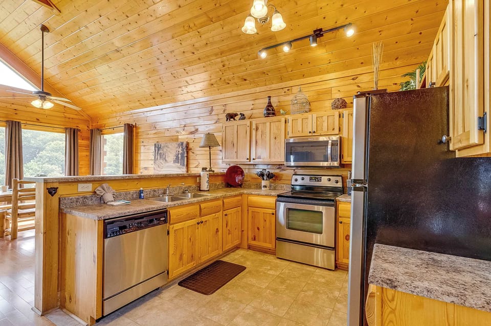 Whip up culinary delights in this bright, spacious kitchen with stunning mountain views!