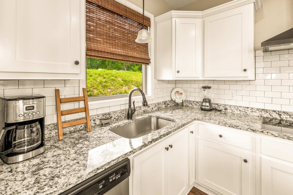 Bright and modern space with granite countertops, perfect for delicious meals!