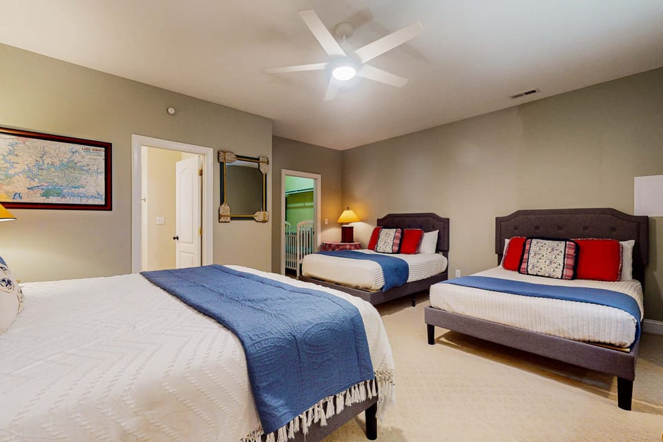 Spacious Family Retreat awaits. A generous room with two comfortable beds and bright, welcoming decor!