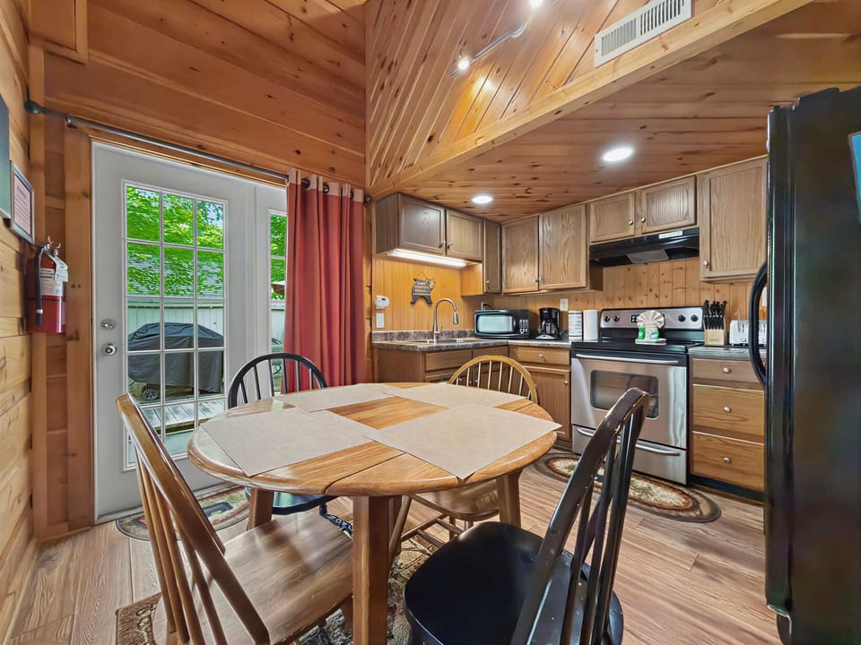 Unleash your inner chef amidst warm wood accents and vibrant natural views!