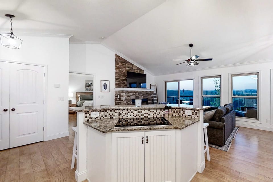 Open-concept living space awaits. And, revel in stunning views and modern charm from this inviting retreat!