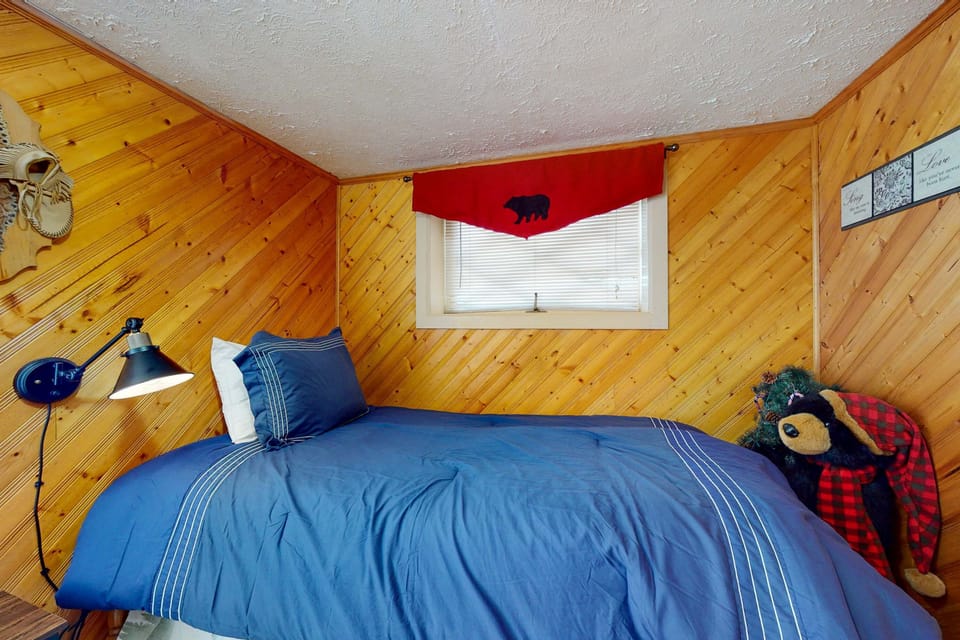 Nestle into a charming nook with natural wood accents and cozy mountain vibes!
