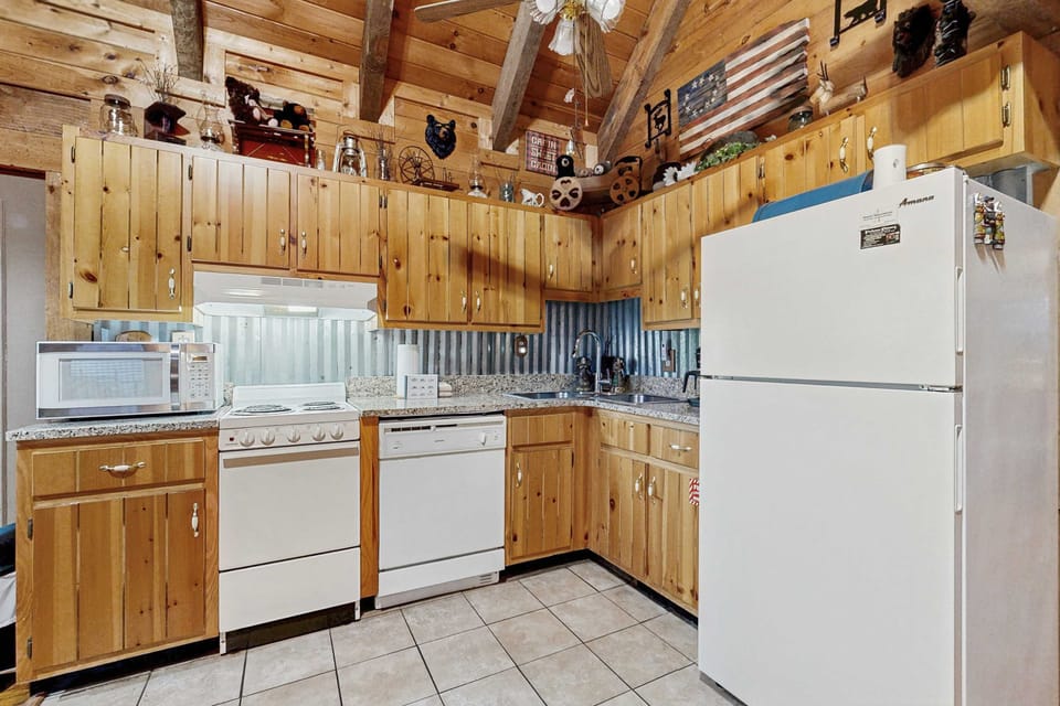 Kitchen delight awaits. A rustic charm meets modern convenience in this well-equipped kitchen!