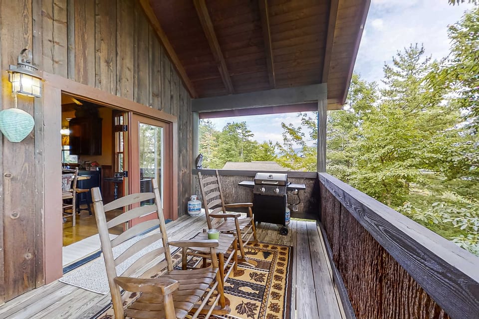 Deck retreat awaits. And, enjoy stunning views while grilling and relaxing in this inviting outdoor space!