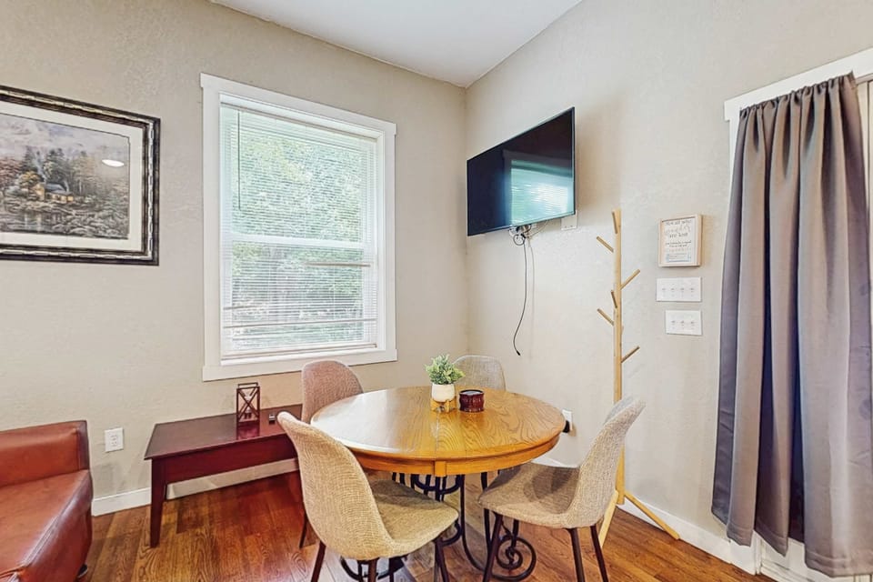 Dining table nook awaits, complete with a charming table to enjoy meals and laughter together!