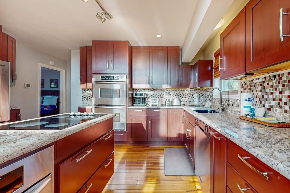 Modern design meets gourmet potential in this vibrant, open-concept kitchen!
