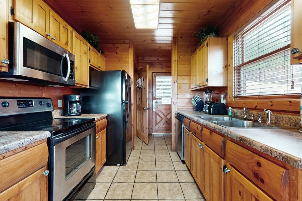 Dive into culinary adventures with modern appliances and rustic charm!
