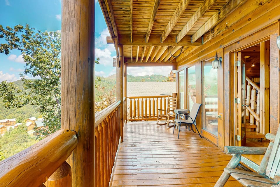 Outdoor Deck, enjoy stunning views while sipping coffee in your private log cabin retreat!