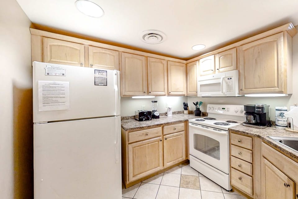 Whip up meals in this bright space with modern appliances and ample storage!