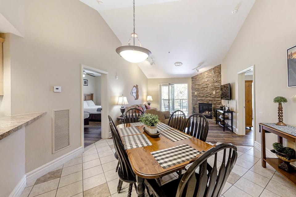 Gather around the stylish table for memorable meals and mountain views!