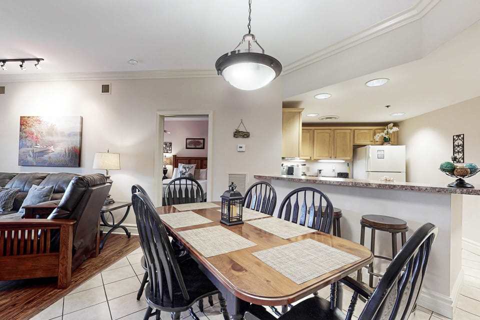 Gather around the charming wooden table for memorable meals and laughter!