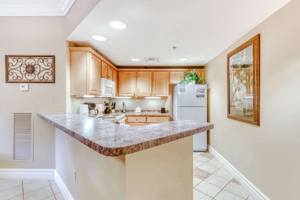 Modern design meets charm in this fully equipped kitchen, perfect for culinary adventures!