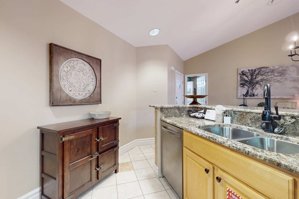 Modern charm with granite counters, stylish decor, and a perfect cooking space!