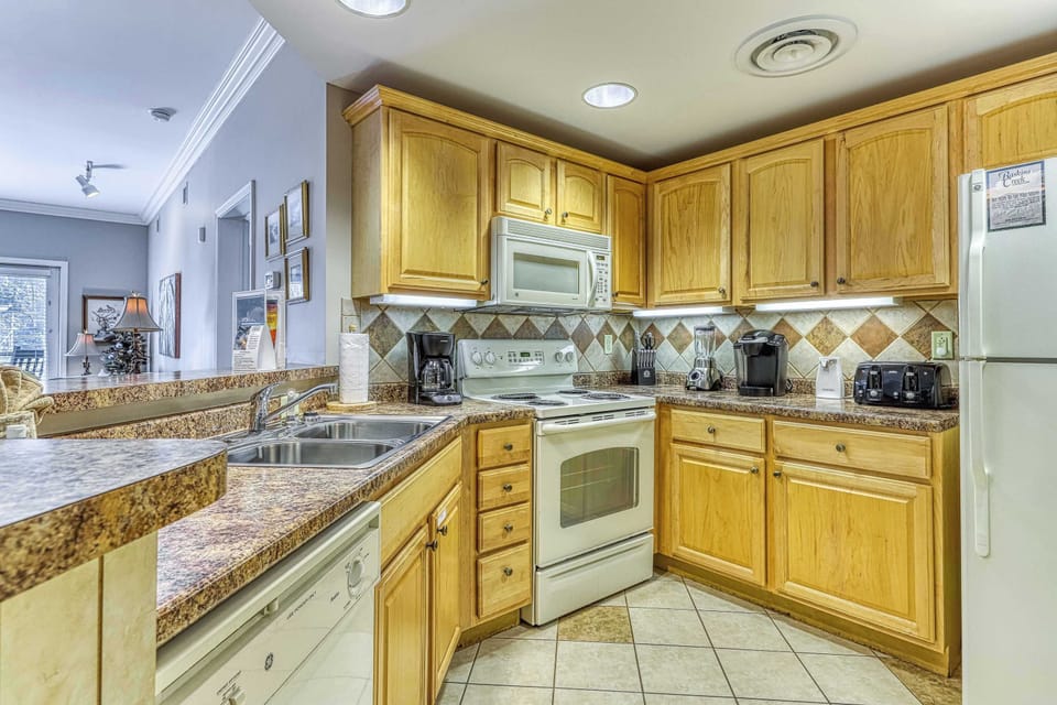 Cook up a storm in this bright, fully-equipped kitchen with elegant finishes!
