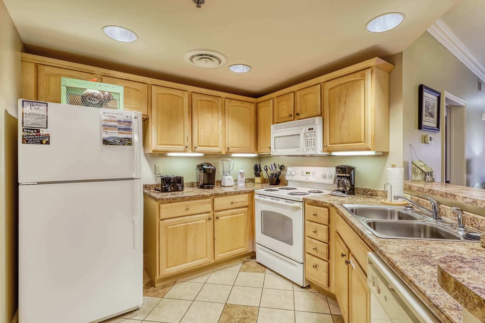 Whip up your favorite meals surrounded by modern appliances and warm wood accents!