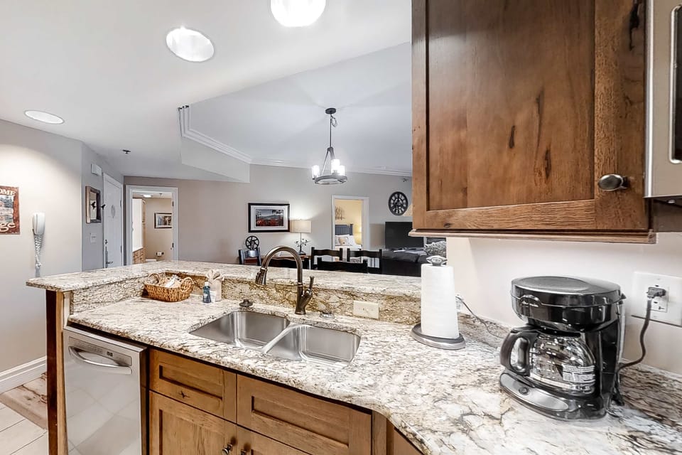 Whip up delicious meals in this stylish space with granite counters and modern appliances!