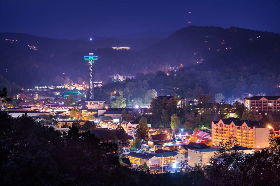 Delight in twinkling city lights and majestic mountains from your private balcony!