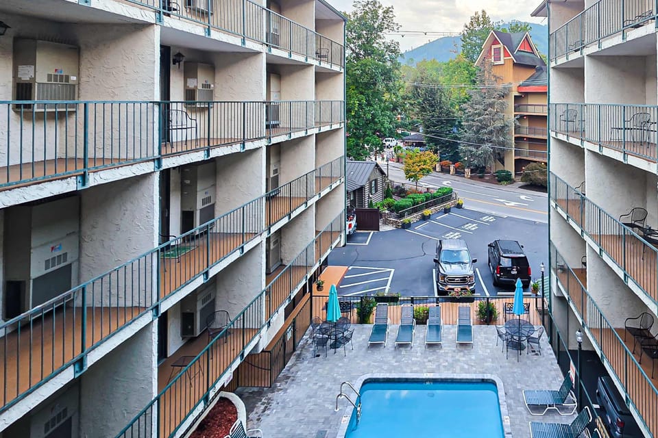 Your Outdoor Shared Pool Oasis awaits! Splash into fun from your stylish balcony view, surrounded by nature's beauty!