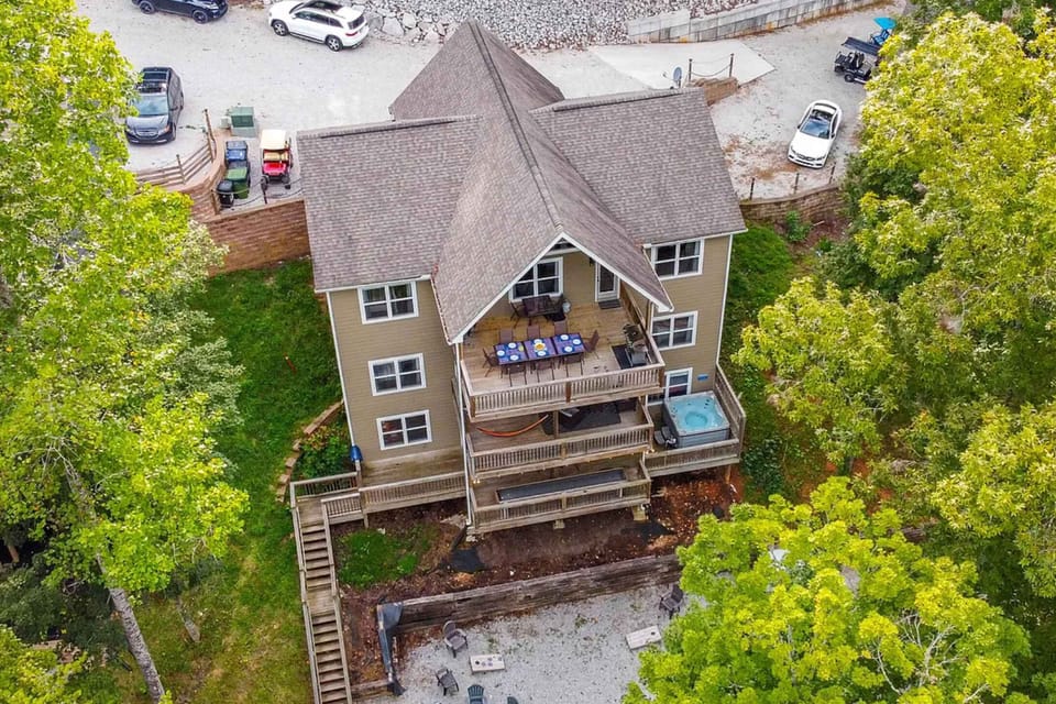 Your outdoor oasis awaits. Spacious decks with hot tub, perfect for sunset views and fun gatherings!