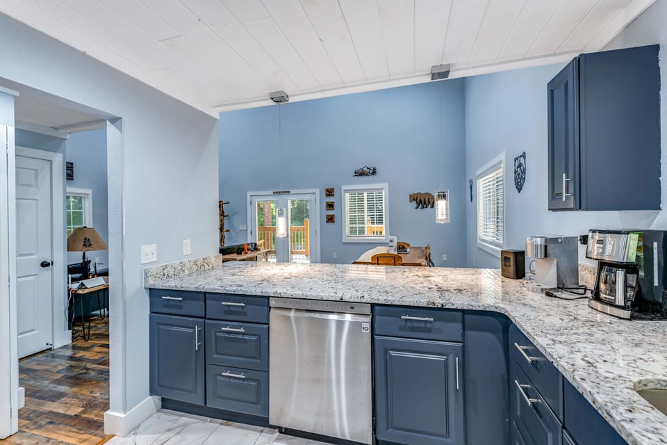 Enjoy modern appliances and a spacious counter, perfect for culinary adventures!Create memorable meals in this stylish, fully-equipped kitchen with modern appliances!
