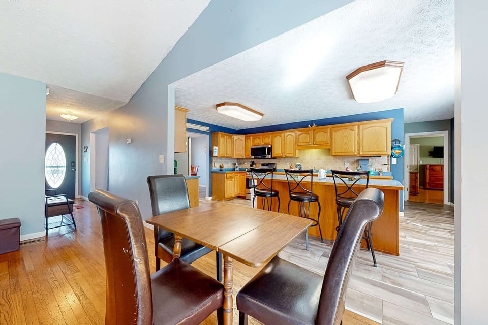 Enjoy meals in a bright space with stylish decor and ample seating!