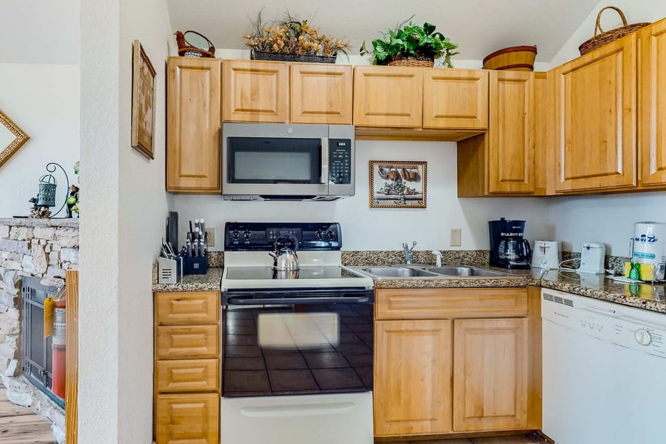 Whip up culinary delights in this spacious, well-equipped kitchen with modern appliances!