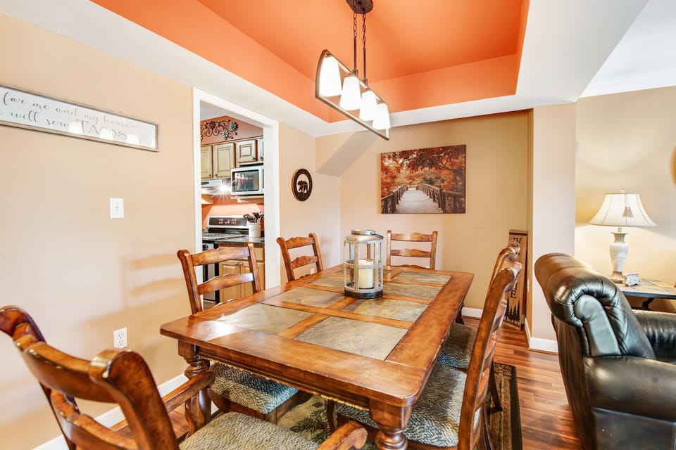 Gather around for delightful meals in this charming, sunlit space!