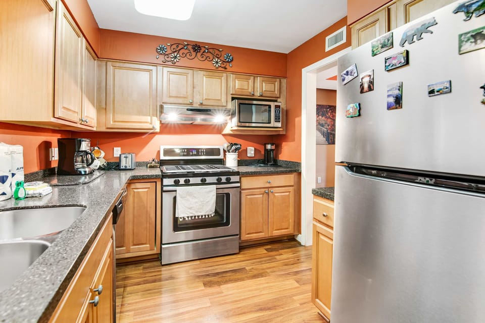 Whip up delicious meals in this stylish space with modern appliances and vibrant decor!