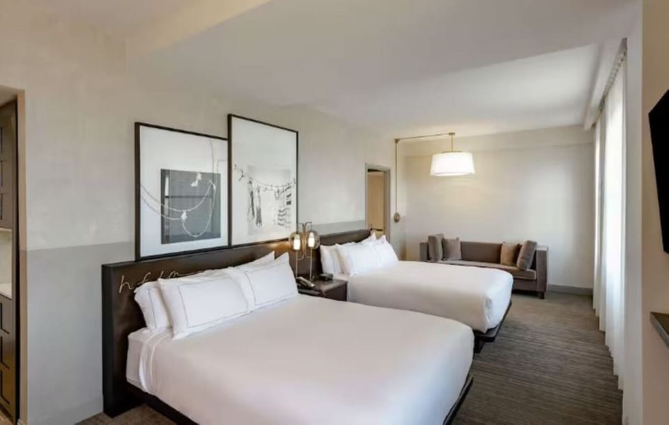 Settle into crisp bedding with roomy seating for unwinding.