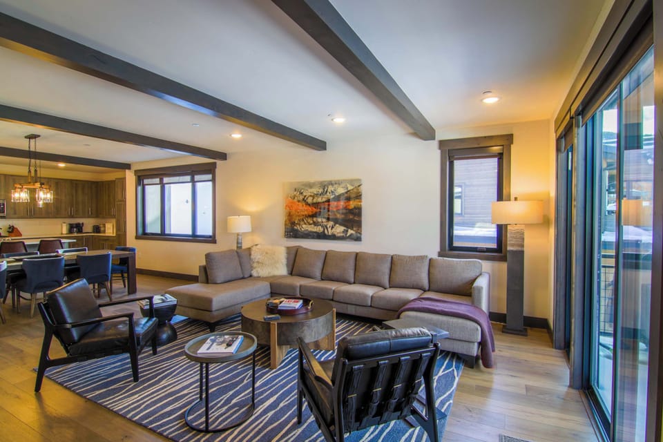 Living Room: Sectional sofa, 60” Samsung Smart TV, gas fireplace, mountain views, deck access