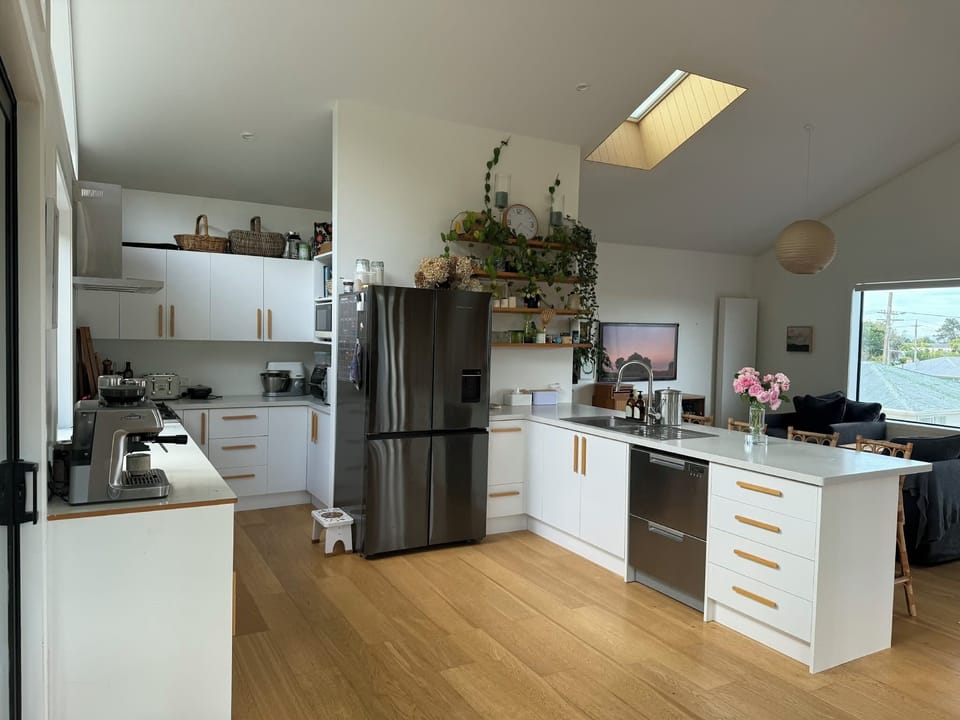 Large fully equipped kitchen including coffee machine