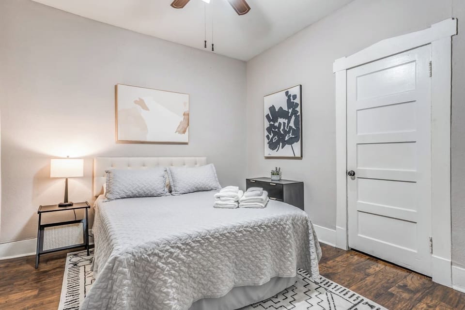 Settle into a peaceful bedroom with soft lighting and cozy bedding for restful, uninterrupted sleep.