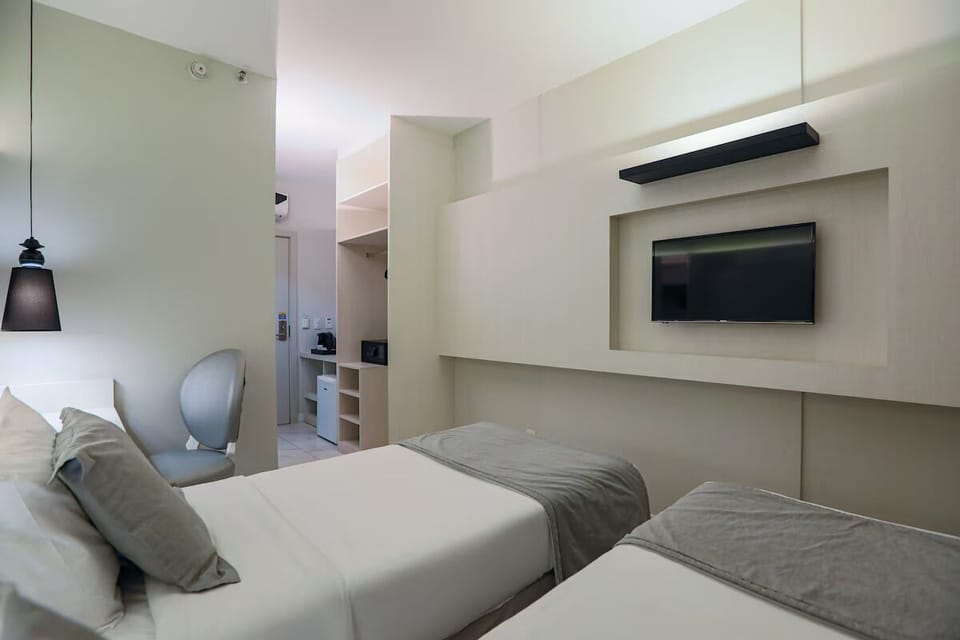 Kick back in bed and enjoy the in-room TV.