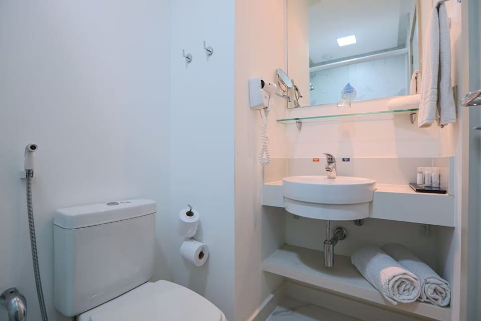 Reset comfortably in a spotless bathroom with fresh towels.