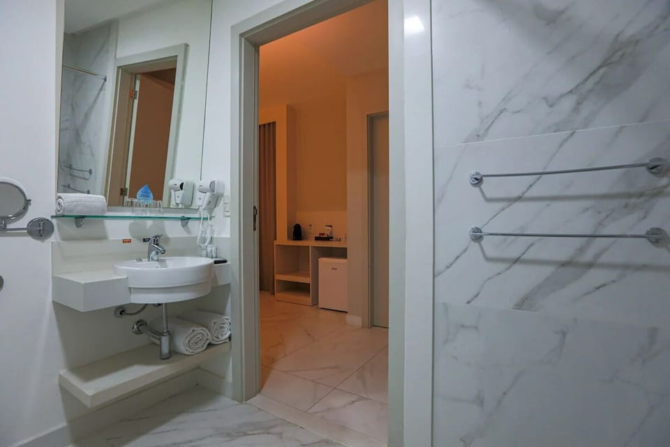 Rinse off after exploring in the clean, modern shower space.