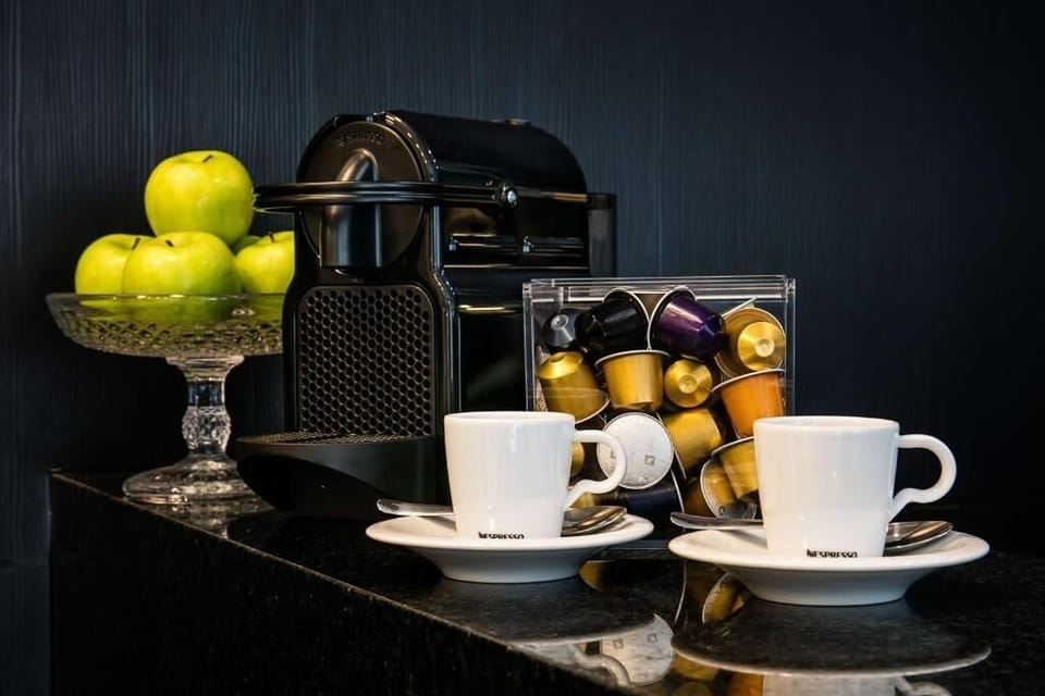 Recharge with espresso anytime, complete with pods and fruit.