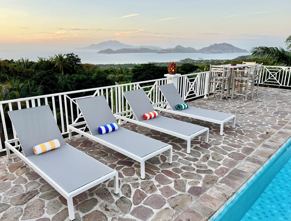 Poolside Loungers with Stunning Ocean Views